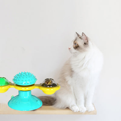 Cat Rotating Windmill Multi - Function Toys Itch Scratching Device Teeth Shining Toy - 0 - CJ